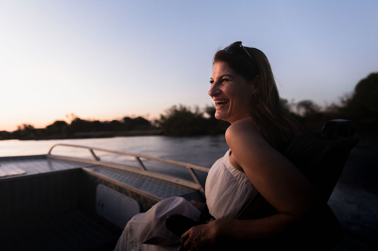 Woman enjoying the calm of the Zambezi River
