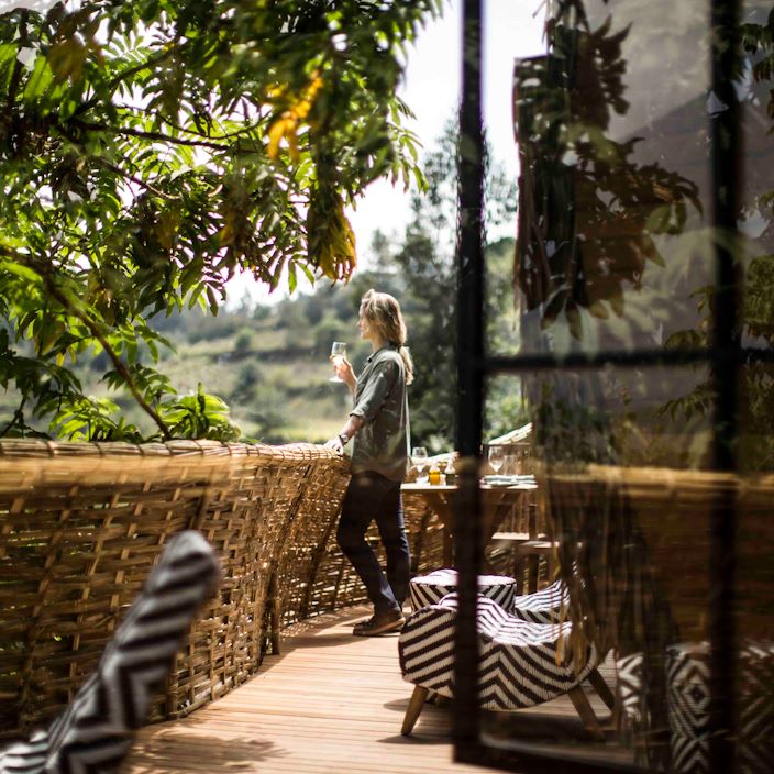 Wilderness Bisate Rwanda Balcony Coffee & Volcanoes view