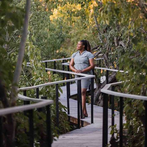 Lady enjoying the quiet of a safari mental wellbeing