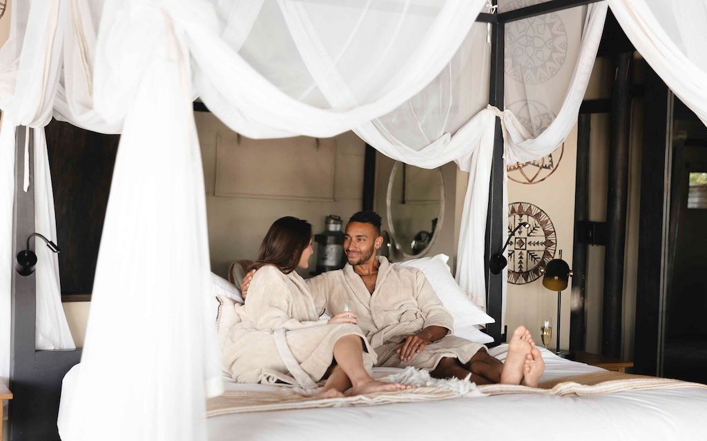 Couple in bed at Wilderness Kings Pool