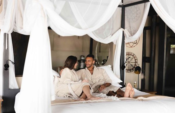 Couple at romantic room Wilderness Botswana