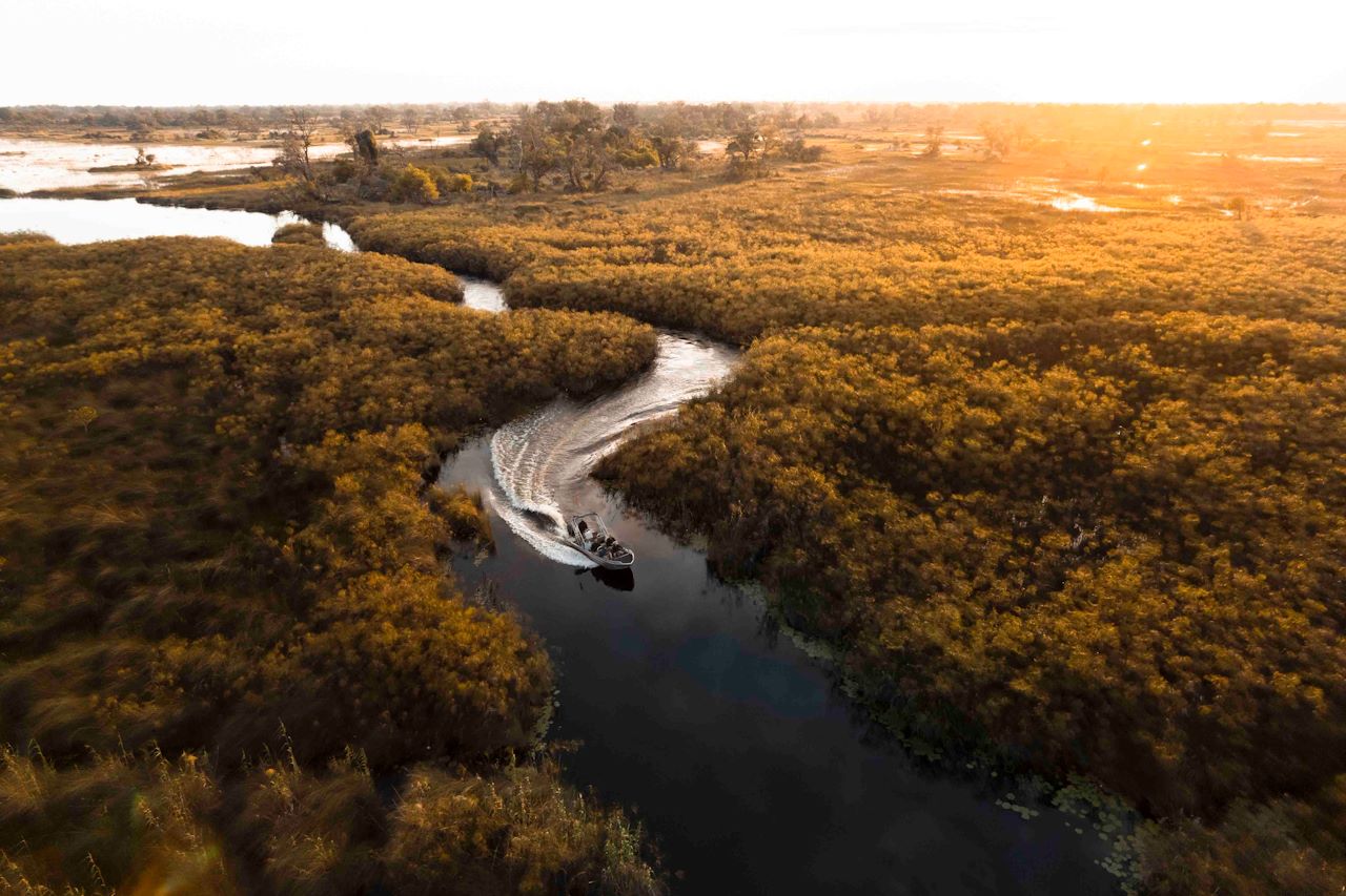 Wilderness Vumbura Plains Botswana Boating in Channels